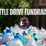 a collection of empty plastic bottles to depict a bottle drive fundraiser